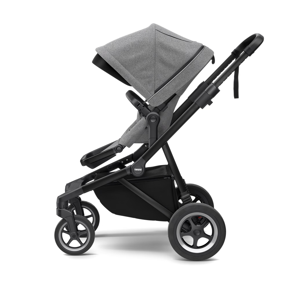 Side view of original Thule Sleek stroller in gray melange with a black frame and one seat