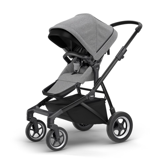 Original Thule Sleek stroller in gray melange with a black frame, front three-quarter view