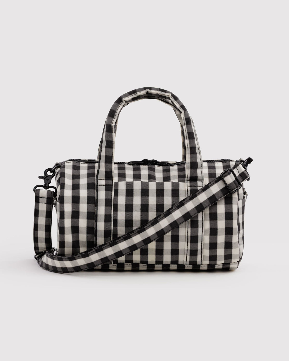 BAGGU Nylon Duffle Bag in Black and Cream Gingham, front view on a light background | Black and Cream Gingham