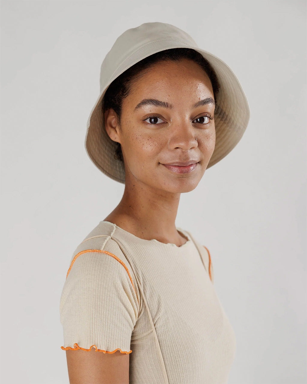 Baggu Bucket Hat on model | Brown Rice