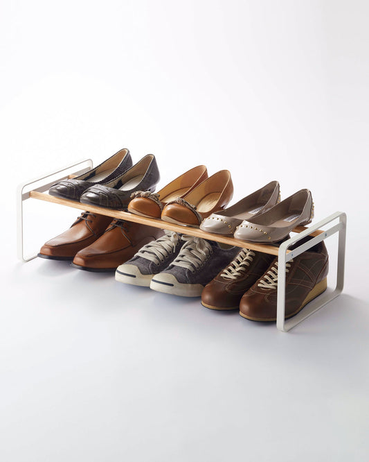 Yamazaki Home Plain Stackable Shoe Rack (7" H) - Steel + Wood, white shoe rack holding shoes above and below the shelf