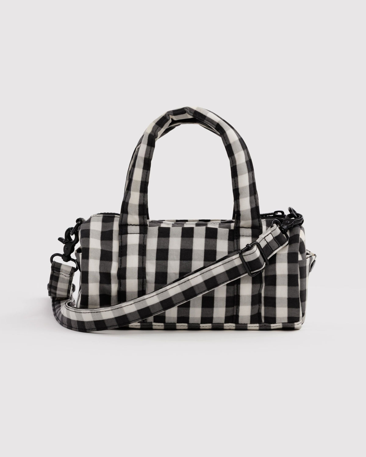 BAGGU Small Nylon Duffle Bag in Black and Cream Gingham, front view on a light background | Black and Cream Gingham