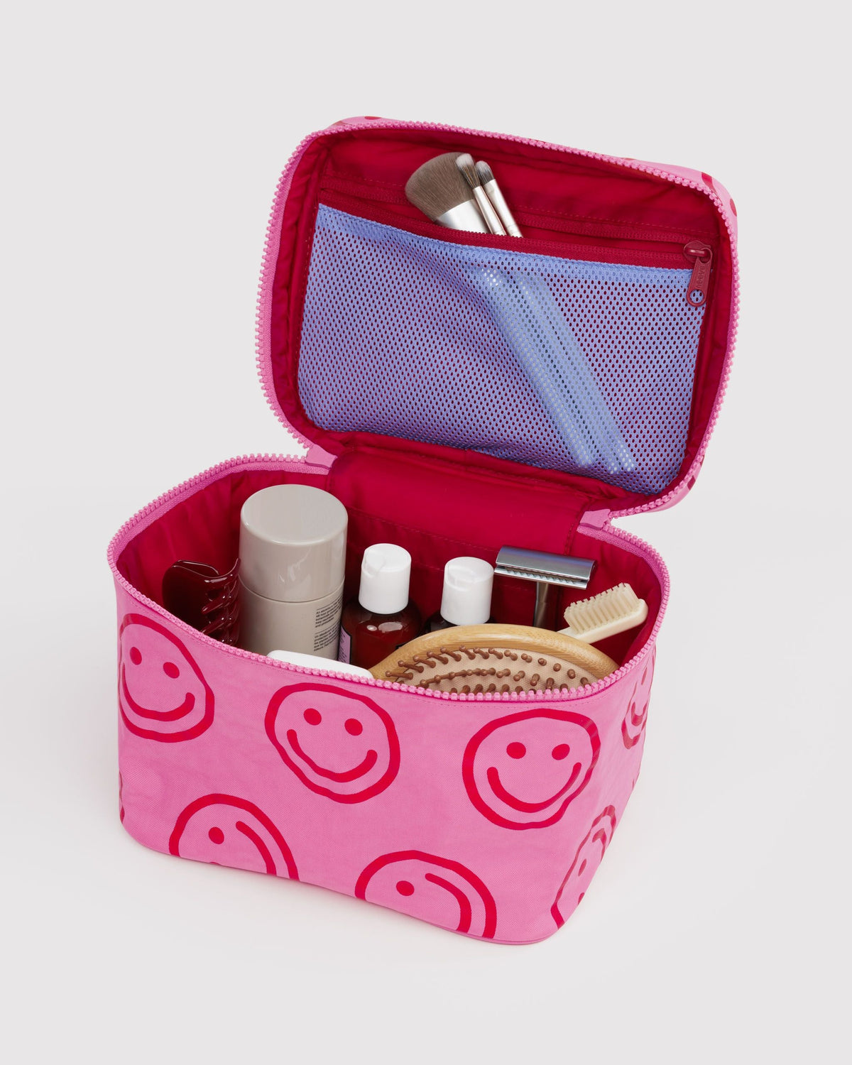 BAGGU Large Cosmetic Case in Azalea Pink Happy, open with toiletries | Azalea Pink Happy