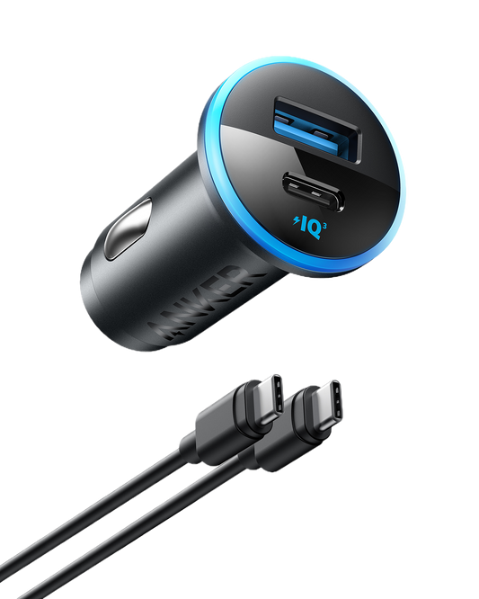 Anker 323 car charger beside its included USB-C to USB-C cable, showing a blue-rimmed face with USB-A and USB-C ports.