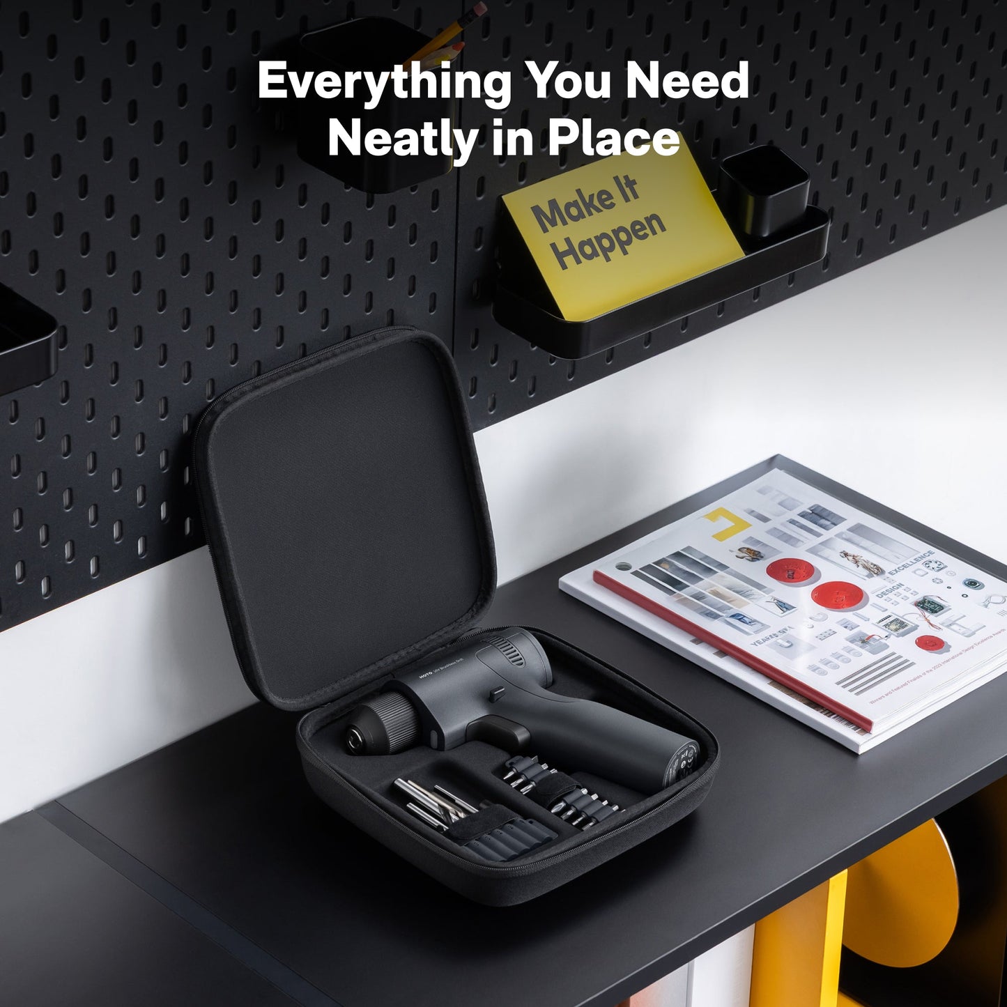 Black tool set in a case on a desk with motivational poster in the background