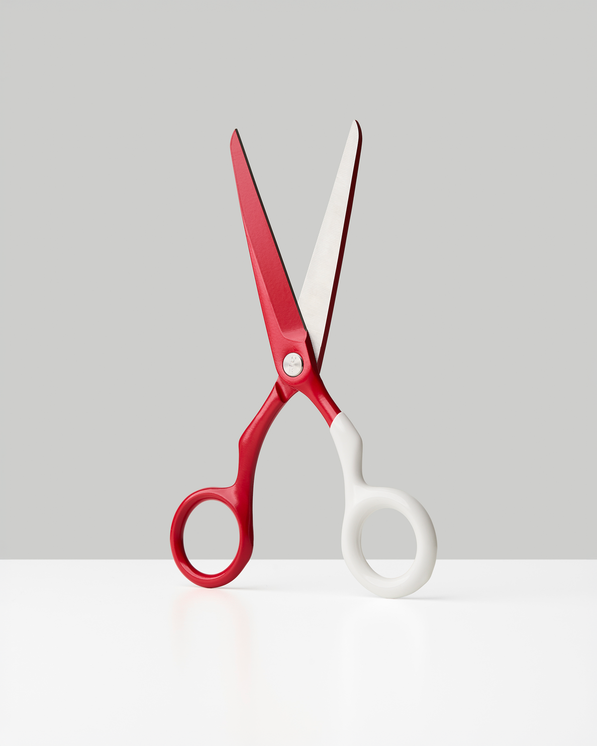 Craighill Spectra Scissors in Red + White, shown open against a gray background | Red + White