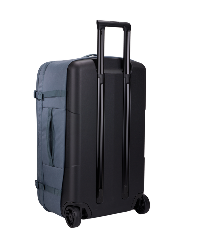 A dark gray and black hard-shell spinner suitcase with an extended telescoping handle, shown from a three-quarter angle against a plain white background. THULE Aion Wheeled Duffel Bag 70CM/28