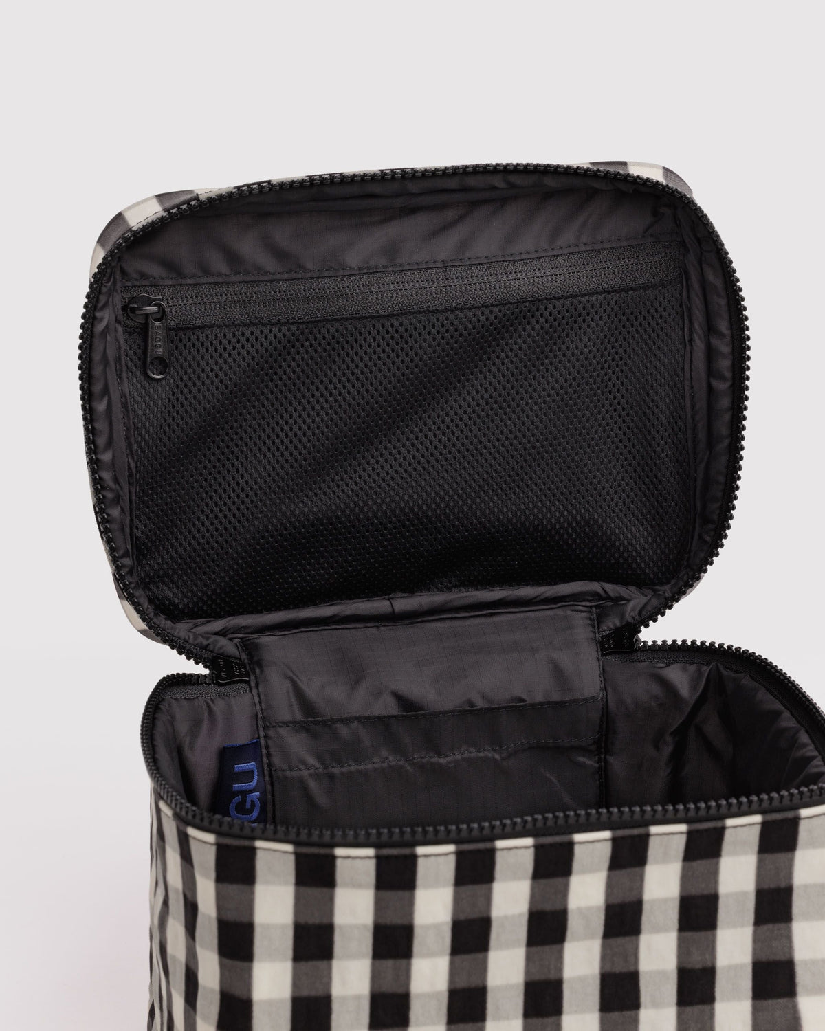 BAGGU Large Cosmetic Case in Black and Cream Gingham, interior mesh pocket detail | Black and Cream Gingham