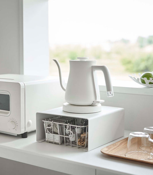 Yamazaki Home Tower Stackable Countertop Shelf - Steel, white shelf holding electric kettle above storage basket
