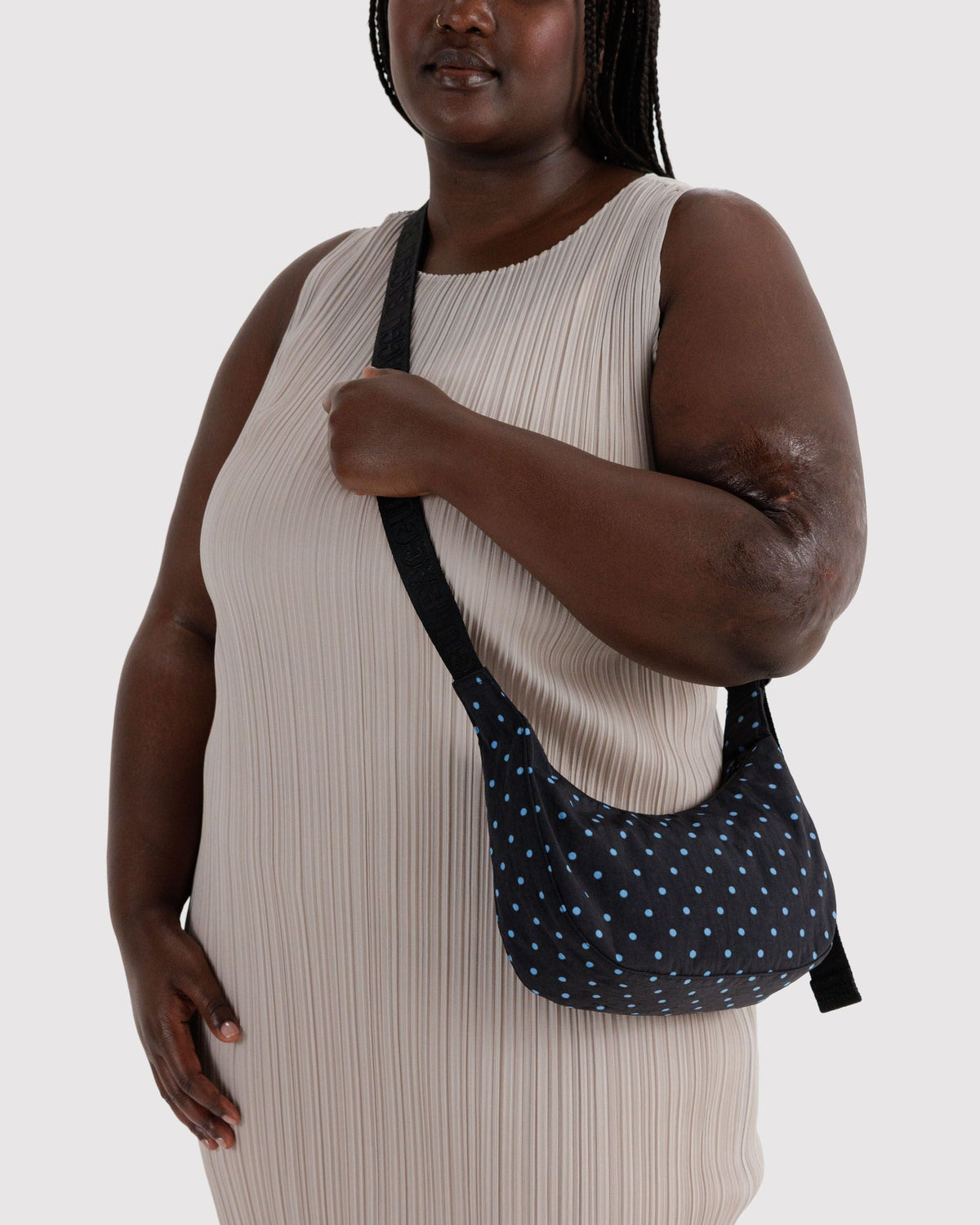 Baggu Small Nylon Crescent Bag in Black and Sky Blue Micro Dot, crossbody carry on model | Black and Sky Blue Micro Dot
