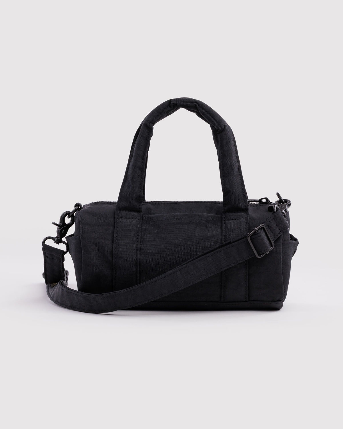 BAGGU Small Nylon Duffle Bag in Black, front view on a light background | Black
