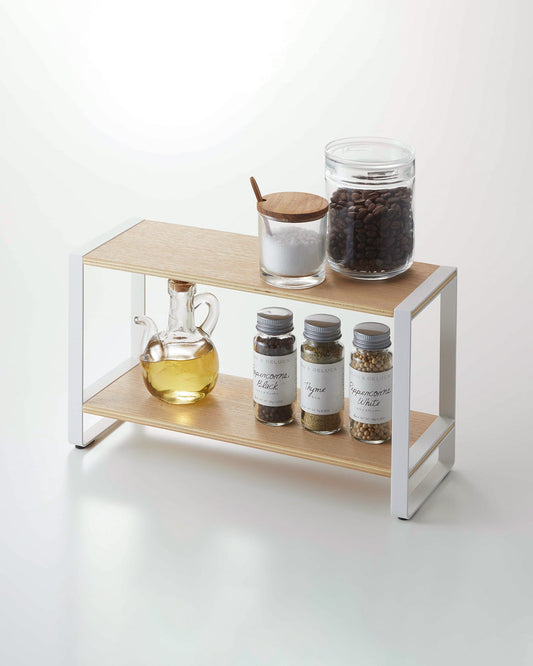 Yamazaki Home Tosca Two-Tier Riser - Steel + Wood, two-tier wood shelf holding oil and spice jars