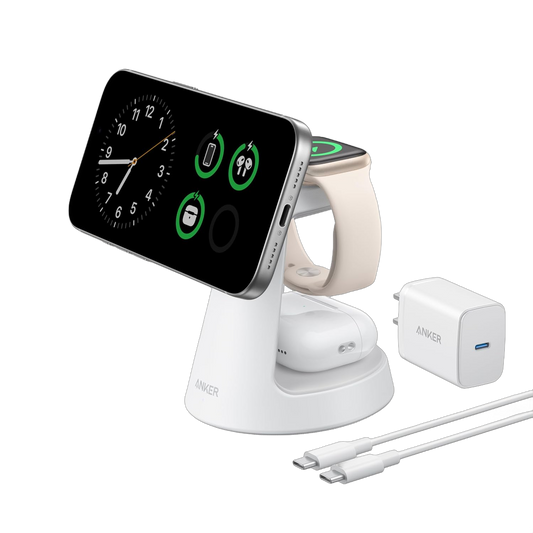 White Anker MagGo three-in-one dock shown with its included adapter and USB-C cable, holding illustrative phone, Apple Watch and earbud case.