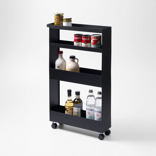 Yamazaki Home Tower Slim Rolling Wagon - Four-Tier Steel — black wagon with jars, cans and bottles.