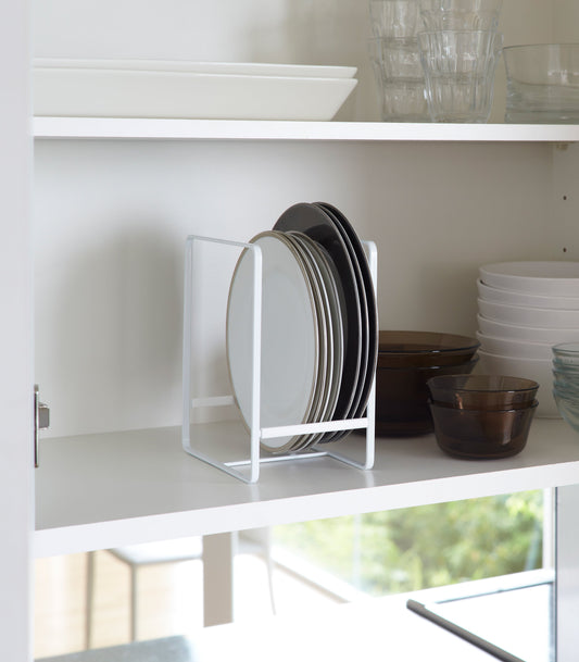 Yamazaki Home Tower Plate Holder - Steel, white holder storing plates upright in cabinet