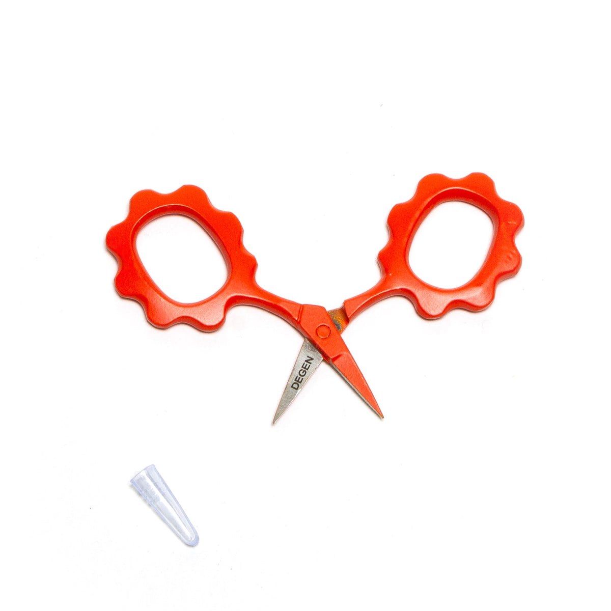 Open DEGEN Swerve Mini Scissors in Poppy with a clear plastic tip protector | Poppy