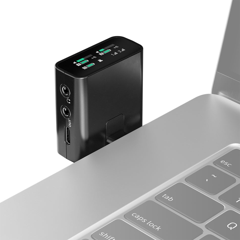 Sennheiser Profile Wireless receiver connected to a laptop with its display visible
