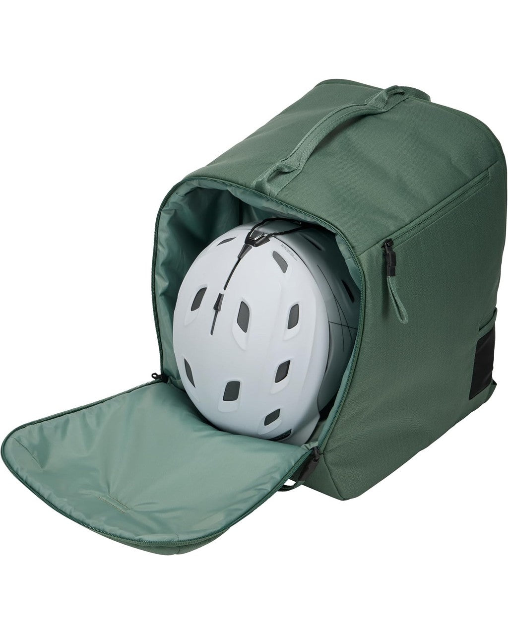 Green backpack with a white helmet inside on a white background Thule Roundtrip Boot Bag 35L | Hazy Green