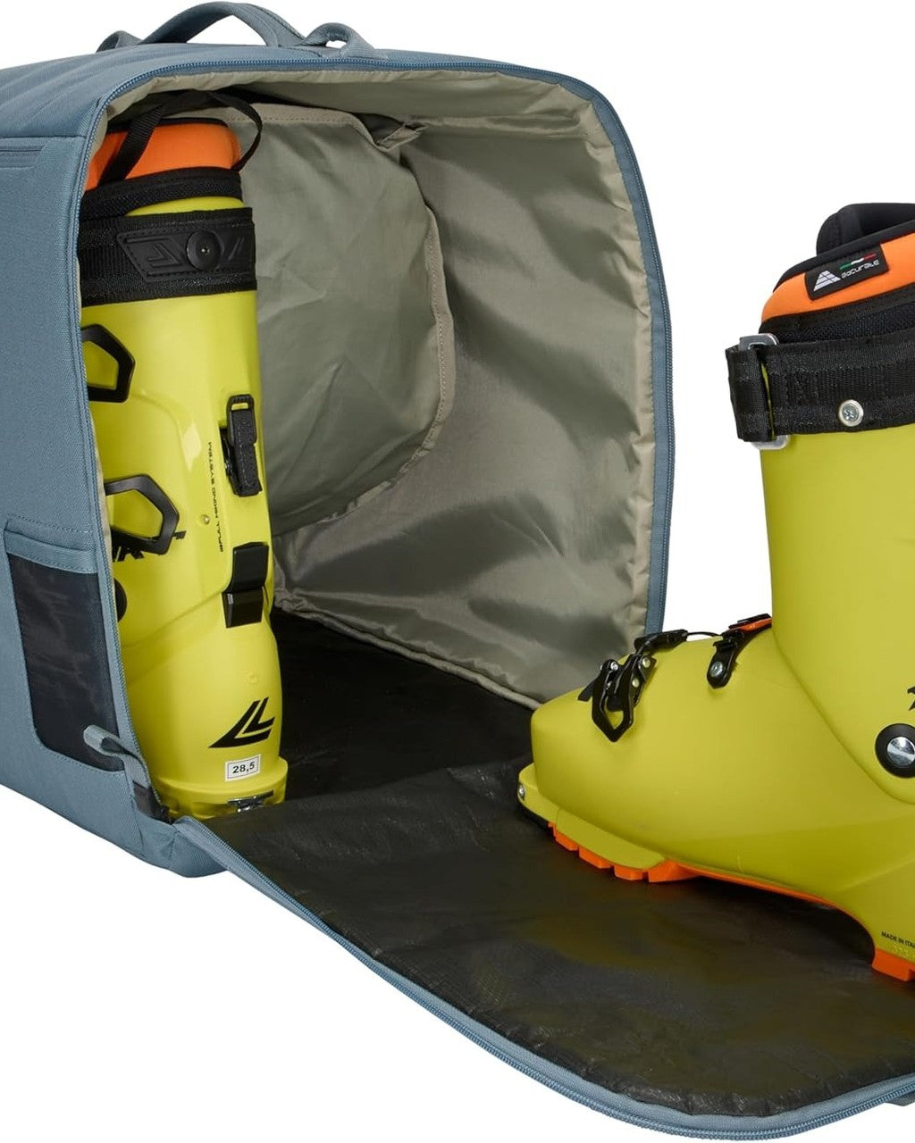 Yellow boots with orange accents in a gray bag Thule Roundtrip Boot Bag 35L | Mid Blue