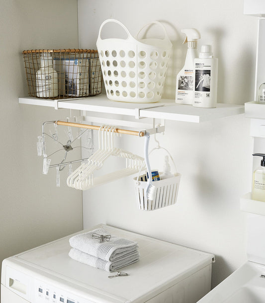 Yamazaki Home Tosca Undershelf Hanger - Steel + Wood, white undershelf hanger holding clothes hangers above washing machine