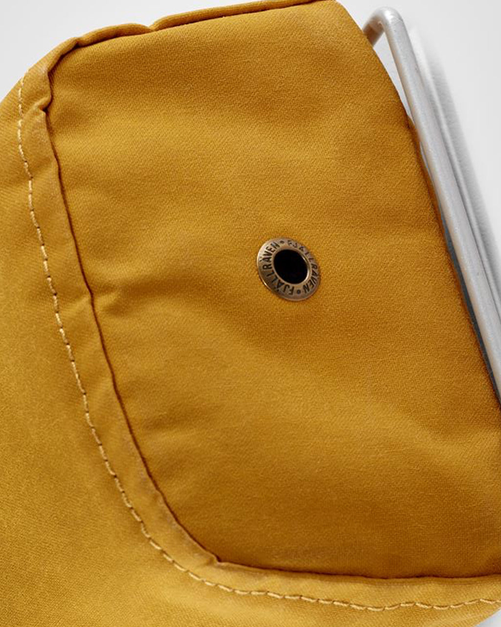 Close-up of Fjallraven Kanken Bottle Pocket's fabric and closure