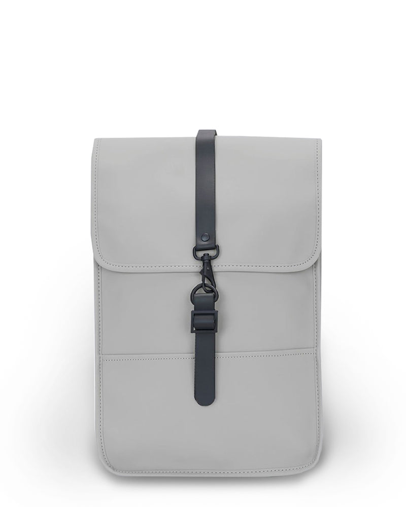 backpack rains mini Mini, Black Waterproof Laptop Bag for Women and Men, Small | Small waterproof backpack in black with a 15 in laptop pocket, flap, and carabiner making it a practical choice for any adventure. RAINS Backpack Mini BrandsWalk